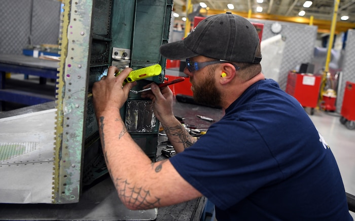 Aircraft mechanic working