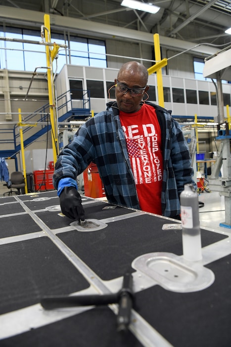 Aircraft mechanic working