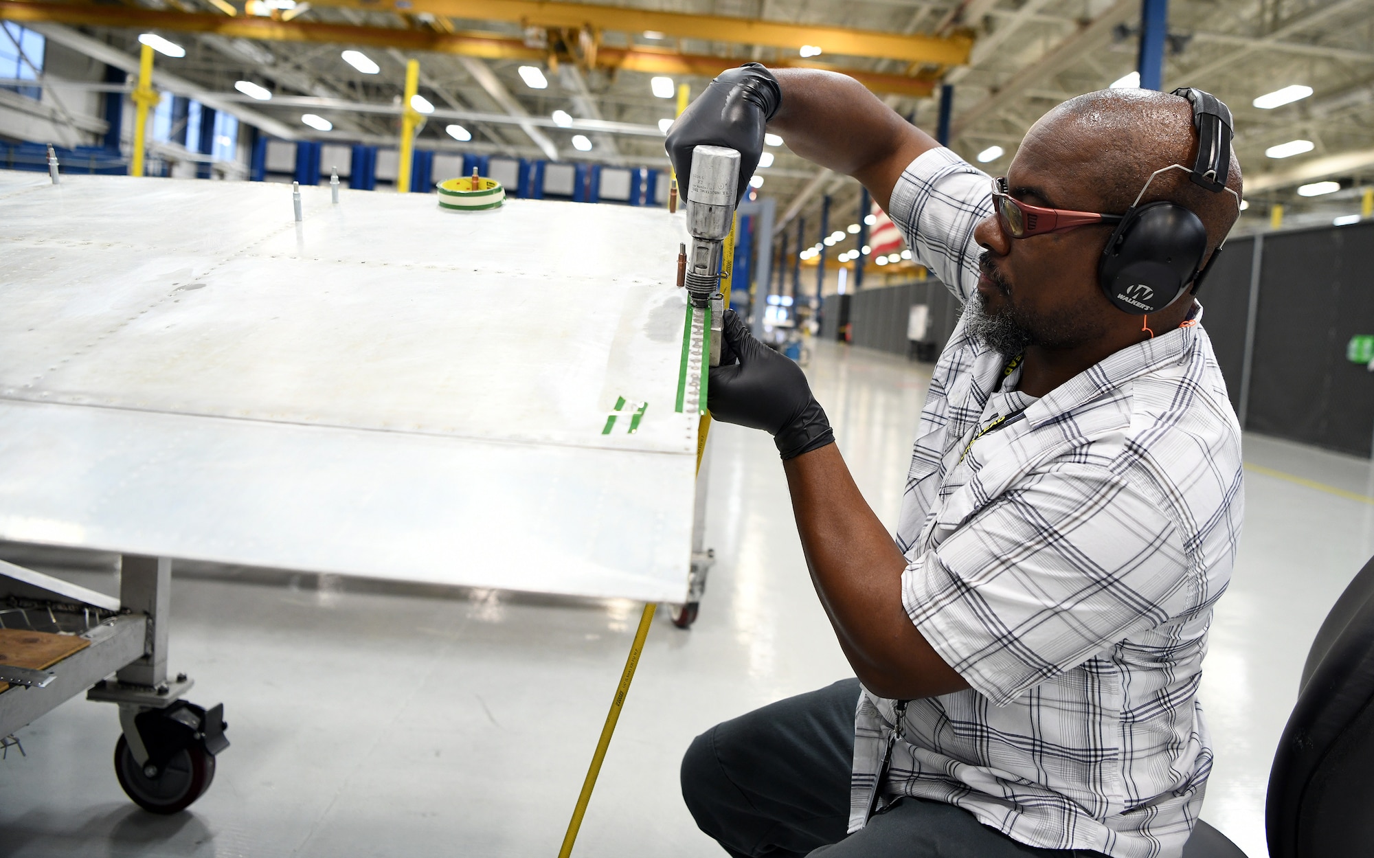Aircraft mechanic working
