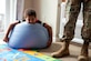 Kameron Cox, son of Krista Cox, rests on a bean bag chair while his mother gives a home tour to U.S. Air Force Col. Ryan A. F. Crowley, commander of Joint Base Anacostia-Bolling and the 11th Wing, following the opening of the newest Family Child Care home at JBAB, Washington, D.C., July 10, 2024. One of the incentives of the Family Child Care Home program is that providers could be eligible to get paid for taking care of their own children. (U.S. Air Force photo by Hayden Hallman)