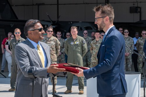 U.S. Ambassador presents a plaque to Slovak Republic state secretary