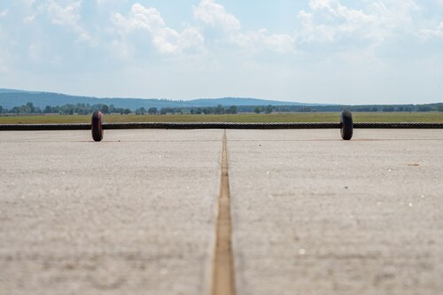 A cable stretches across the runway