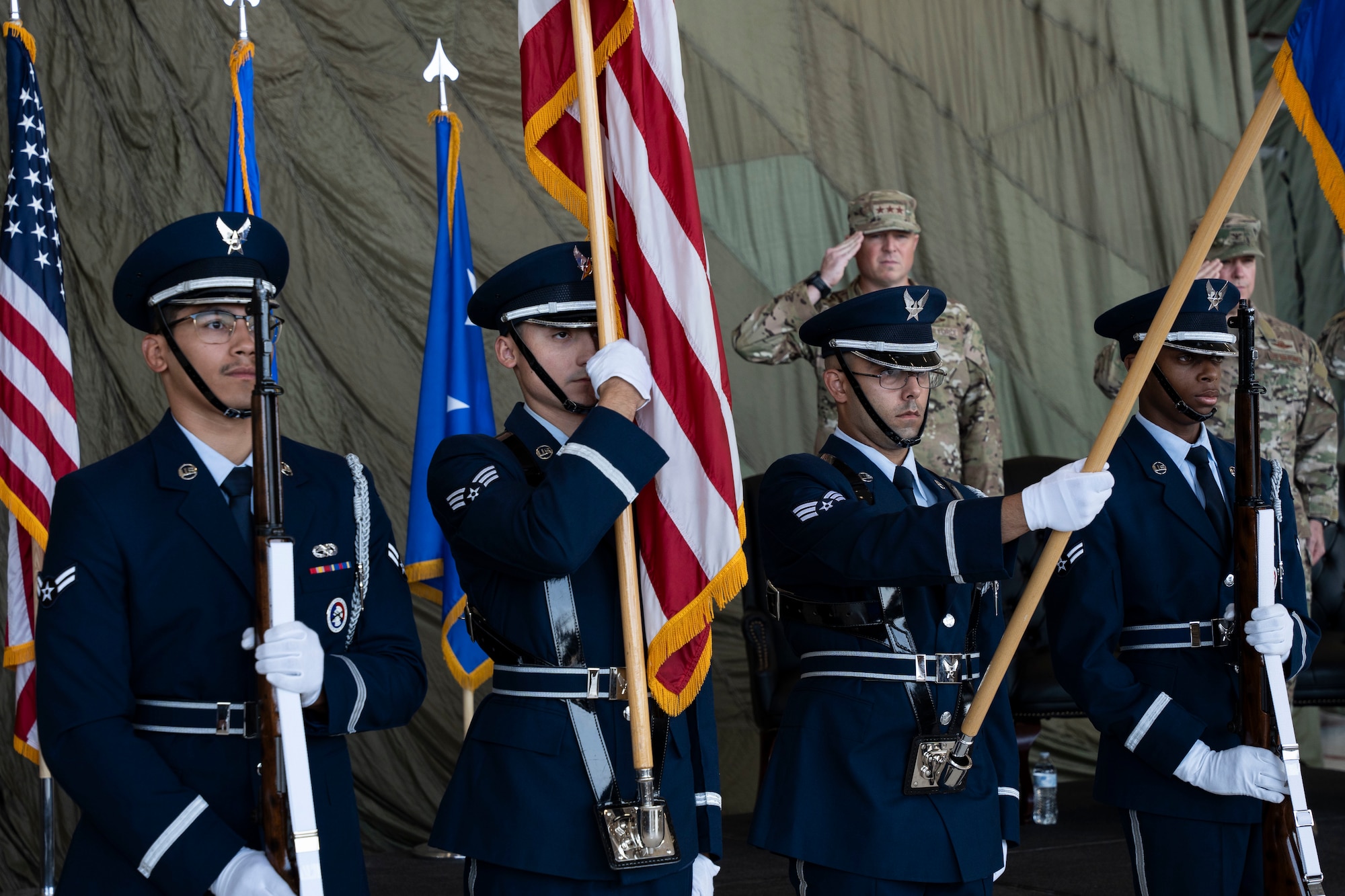 Cannon Air Force Base Honor Guard members present the colors during a change of command ceremony, Cannon AFB, New Mexico, July 15, 2024. The change of command ceremony signifies the formal change of leadership in an organization with the passing of the guidon from the outgoing commander to the incoming commander. (U.S. Air Force photo by Tech. Sgt. Kaylee Clark)