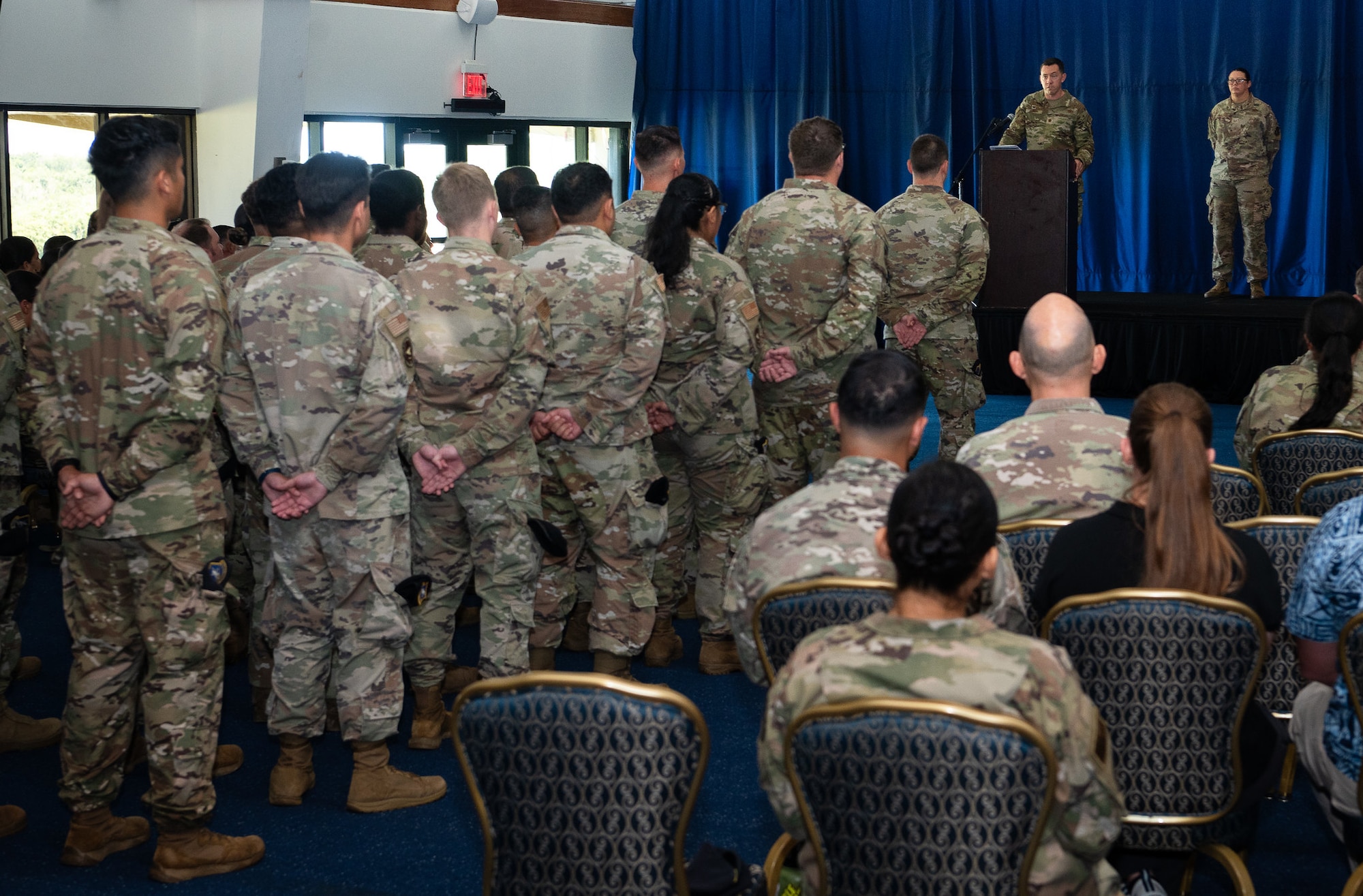 Col. Sheri Kraus, 36th Mission Support Group commander, presents the guidon to Maj. Kevin Brady, incoming 36th Security Forces Squadron commander, during an Assumption of Command Ceremony at Andersen Air Force Base, Guam, July 12, 2024. The 36th SFS is proud of their Arc Light Defender heritage. They are responsible to respond at a moment's notice to any situation that occurs on the Forward Edge. (U.S. Air Force photo by Staff Sgt. Pedro Tenorio)