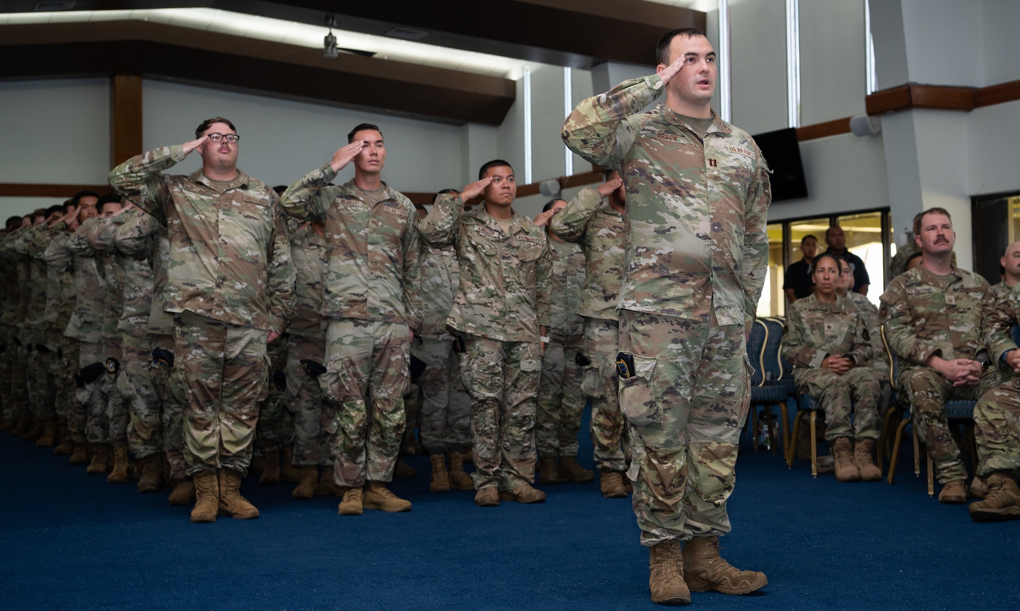 36th Security Forces Squadron defenders render their first salute to their new commander during an Assumption of Command Ceremony at Andersen Air Force Base, Guam, July 12, 2024. The 36th Wing welcomed Maj. Kevin Brady as the new 36th SFS commander. (U.S. Air Force photo by Staff Sgt. Pedro Tenorio)