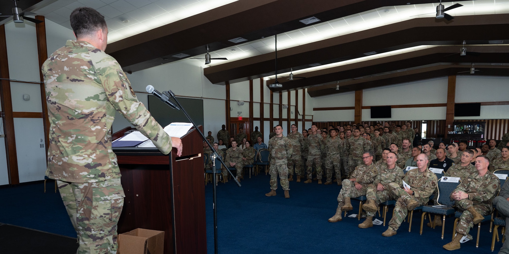 Maj. Kevin Brady, incoming 36th Security Forces Squadron commander, addresses the crowd during an Assumption of Command Ceremony at Andersen Air Force Base, Guam, July 12, 2024. The 36th SFS provides robust security support for five Major Command's Protection Level resources vital to the Nation's security. (U.S. Air Force photo by Staff Sgt. Pedro Tenorio)