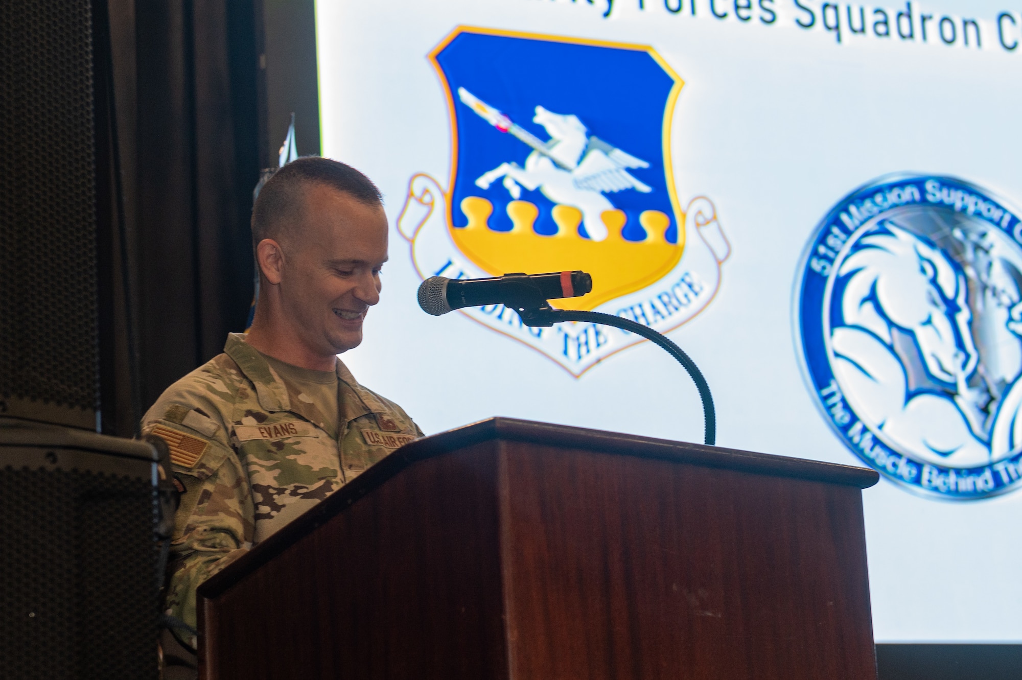 U.S. Air Force Lt. Col. Daniel Evans, 51st Security Forces Squadron commander, gives his first speech to the squadron during a change of command ceremony at Osan Air Base, Republic of Korea, June 12, 2024. The 51st SFS is the largest security forces unit in the Pacific Air Forces, defending the 51st Fighter Wing, which is the most forward-deployed fighter wing in the Air Force. (U.S. Air Force photo by Senior Airman Kaitlin Frazier)