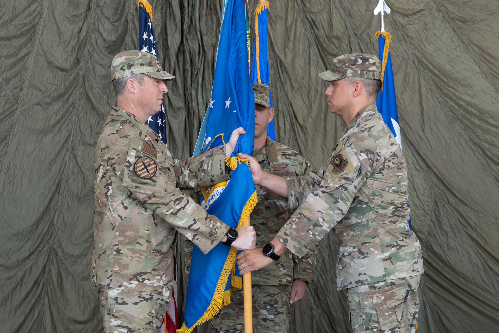 U.S. Air Force Lt. Gen. Michael Conley, left, Air Force Special Operations Command commander, relinquishes command to U.S. Air Force Col. Robert Johnston, 27th Special Operations Wing commander, during a change of command ceremony, Cannon Air Force Base, New Mexico, July 15, 2024. The change of command ceremony signifies the formal change of leadership in an organization with the passing of the guidon from the outgoing commander to the incoming commander. (U.S. Air Force photo by Tech. Sgt. Kaylee Clark)