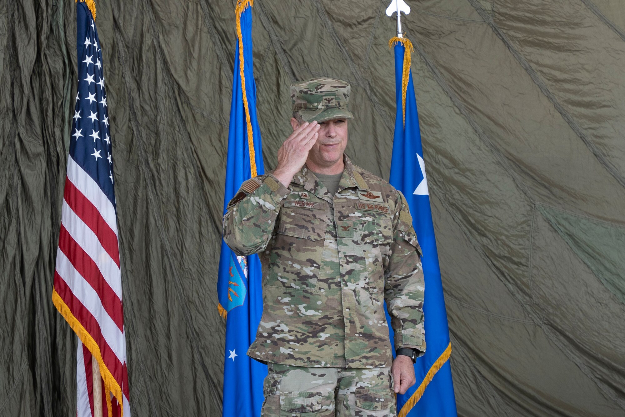 U.S. Air Force Col. Jeremy Bergin, 27th Special Operations Wing outgoing commander, gives his final salute during a change of command ceremony, Cannon Air Force Base, New Mexico, July 15, 2024. While serving as commander of the 27 SOW, Bergin established an off-base dormitory lease to relieve dorm shortages on base, oversaw the establishment of Mission Sustainment Teams and a Special Operations Theater Air Operations Squadron, increased access to quality medical care and led the wing through crisis response and combat deployments. (U.S. Air Force photo by Tech. Sgt. Kaylee Clark)