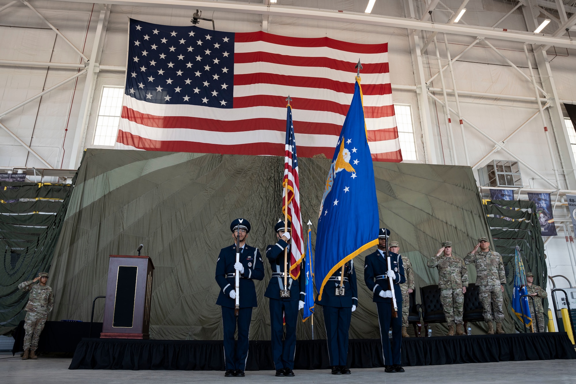 Cannon Air Force Base Honor Guard members present the colors during a change of command ceremony, Cannon AFB, New Mexico, July 15, 2024. The change of command ceremony signifies the formal change of leadership in an organization with the passing of the guidon from the outgoing commander to the incoming commander. (U.S. Air Force photo by Tech. Sgt. Kaylee Clark)