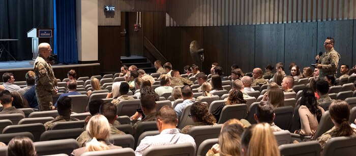 Capt. Miguel Estrada asks a question of Air Force Materiel Command’s Chief Master Sgt. James (Bill) E. Fitch II, during Agile Patriot 2024.