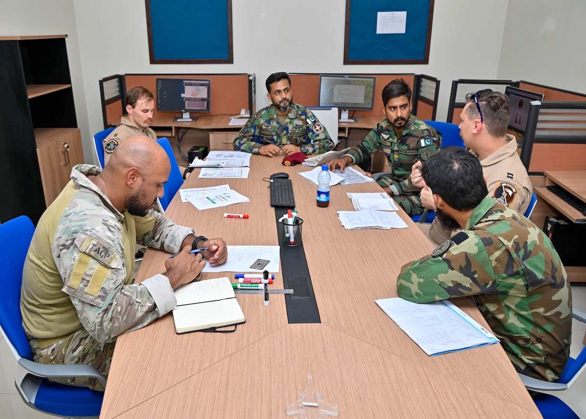 Airmen currently deployed to the U.S. Central Command area of responsibility mission plan with members of the Pakistan Air Force in an undisclosed location in Pakistan during Exercise Falcon Talon, June 4, 2024. The Air Force Central Air Warfare Center deployed a joint terminal attack control instructor to conduct academic training sessions on airspace control authority, coordinated attacks, sensor management, and enhanced target descriptions. (Courtesy photo)