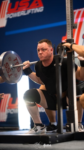Master Sgt. Daniel Turner, 982nd Training Group evaluations superintendent, squats.