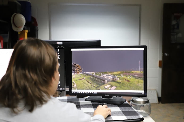Carey Baxter, a CERL research archeologist, examines scans of Mare Island Naval Cemetery