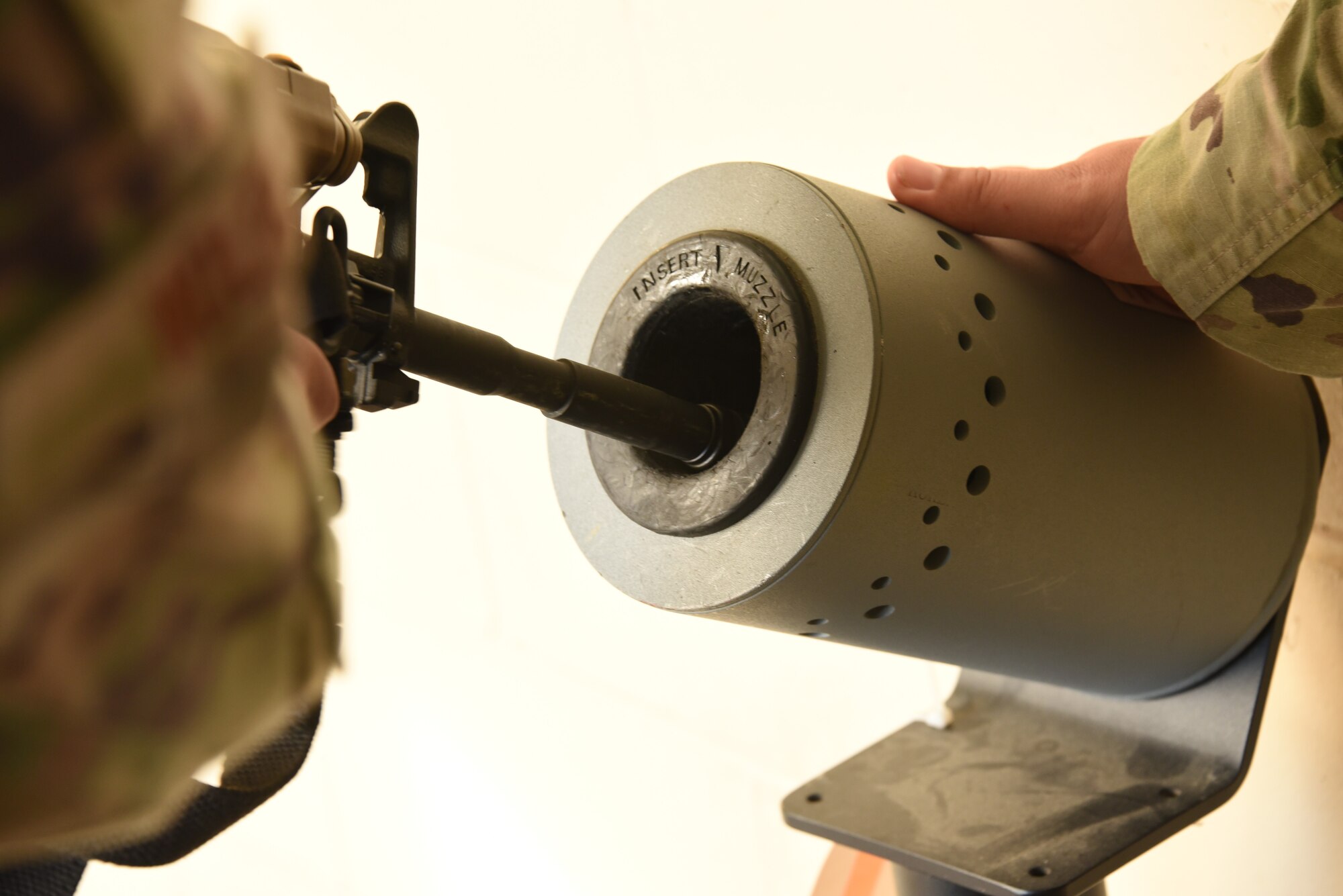 A U.S. Air National Guard Security Forces Airman of the 132nd Wing clears an M4A1 rifle