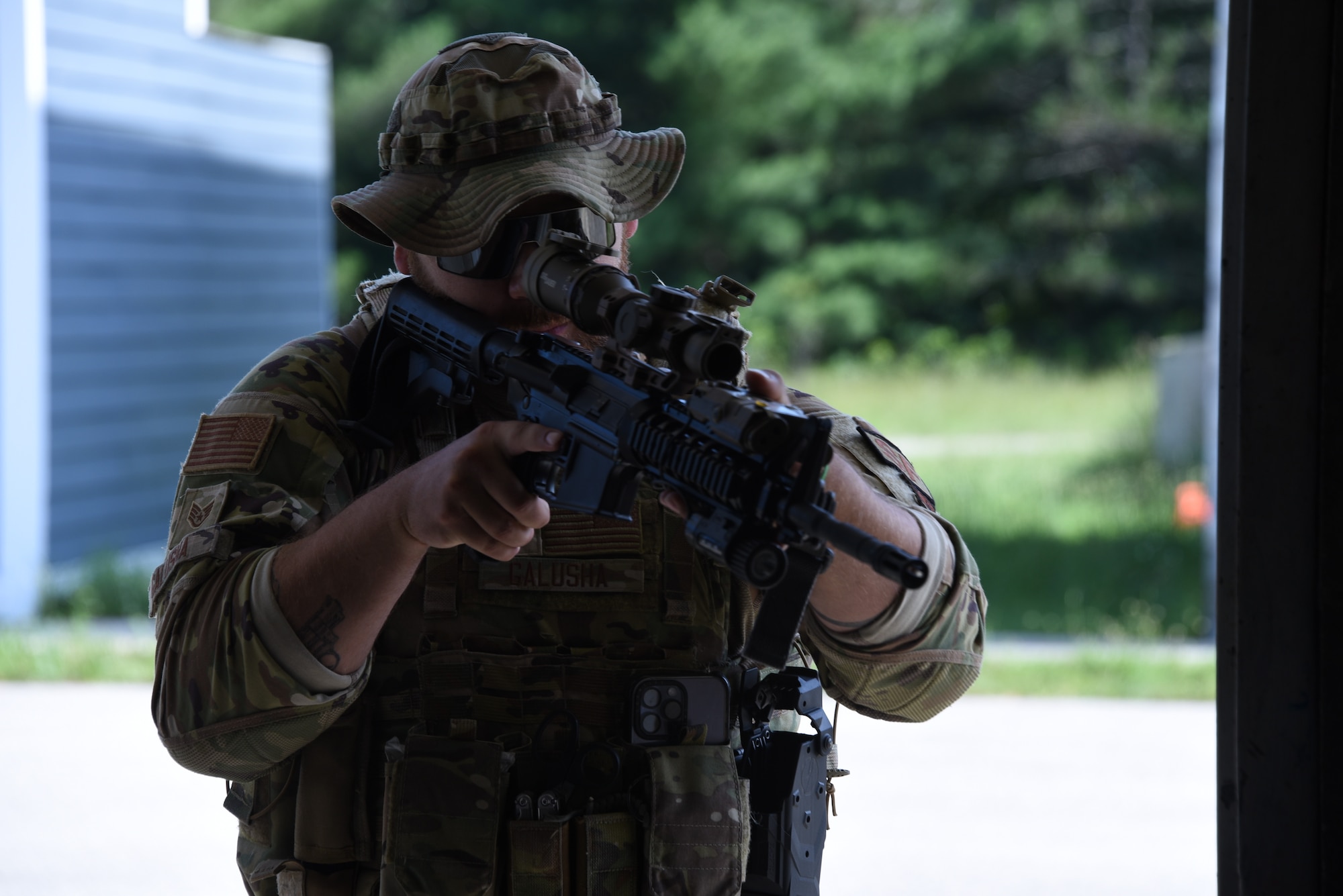 Staff Sgt. Dylan Galusha, 132nd Wing Security Forces, practices entering a building