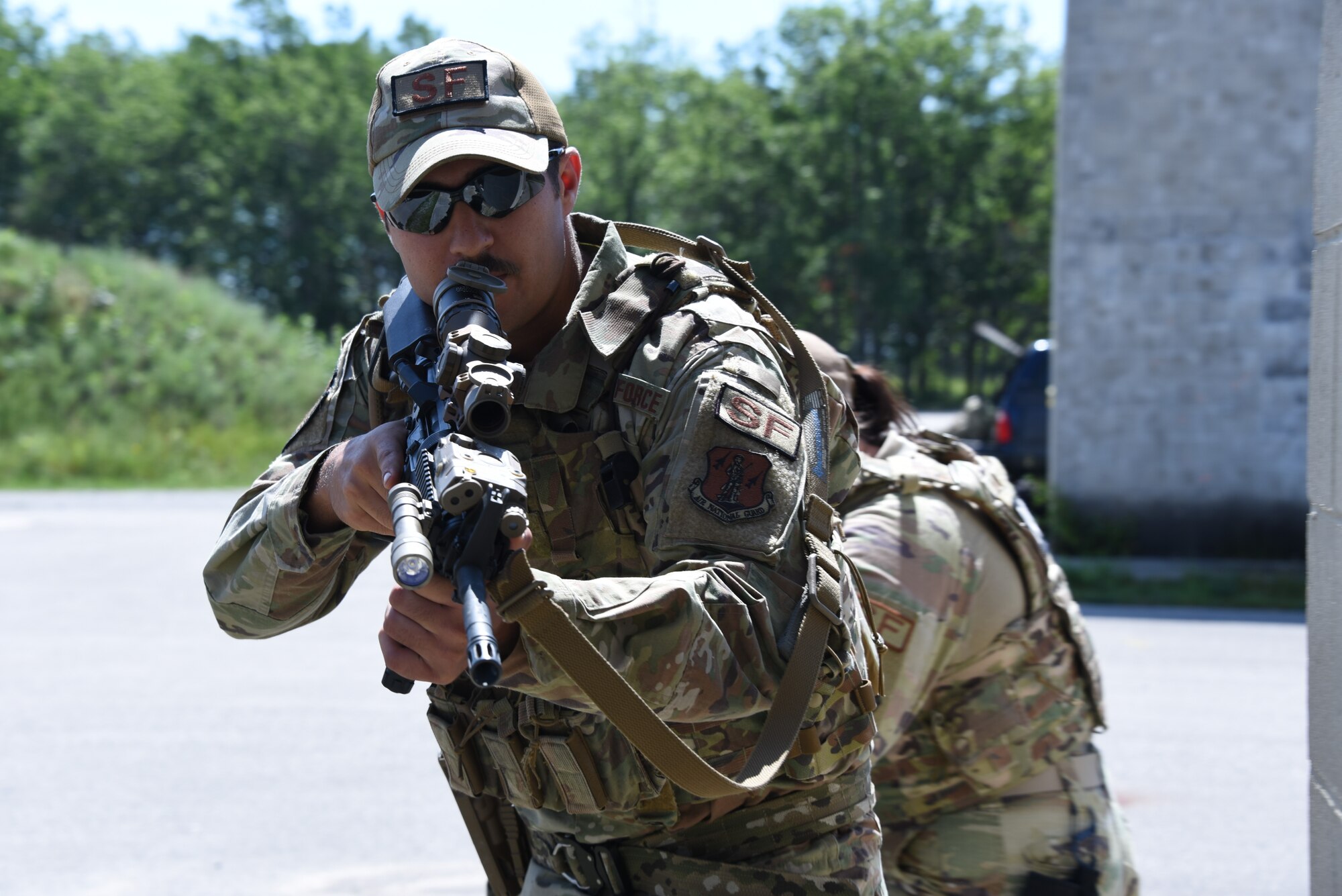 Senior Airman Jake Huerta, 185th Air Refueling Wing Security Forces, practices approaching a building