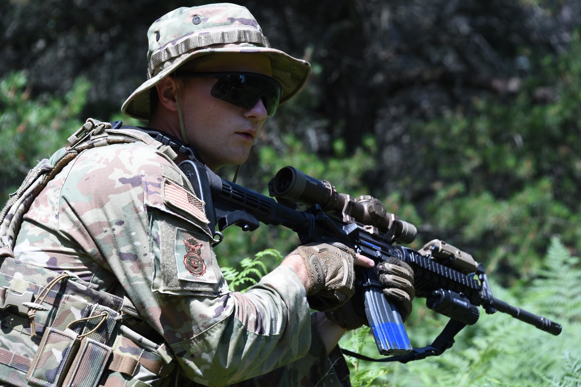 Staff Sgt. Anthony Plesnicar, 132nd Wing Security Forces, watches the terrain