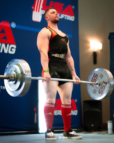 Chris Maynard, 82nd Security Force Squadron police officer, deadlifts.