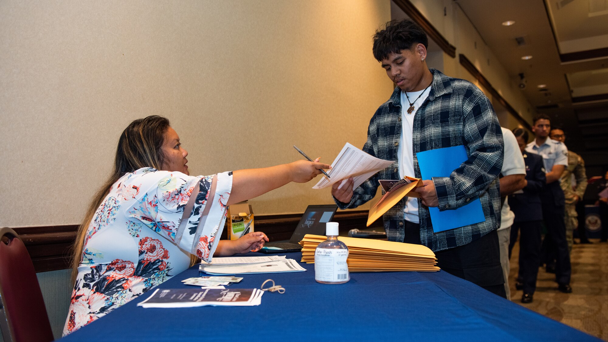 Candidates check-in for ceremony.