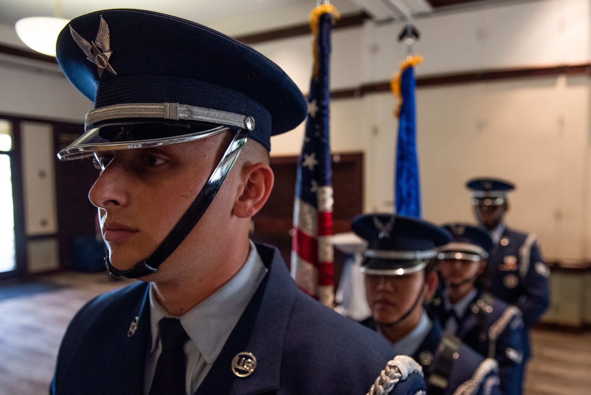 Honor guard standing by to present the colors.