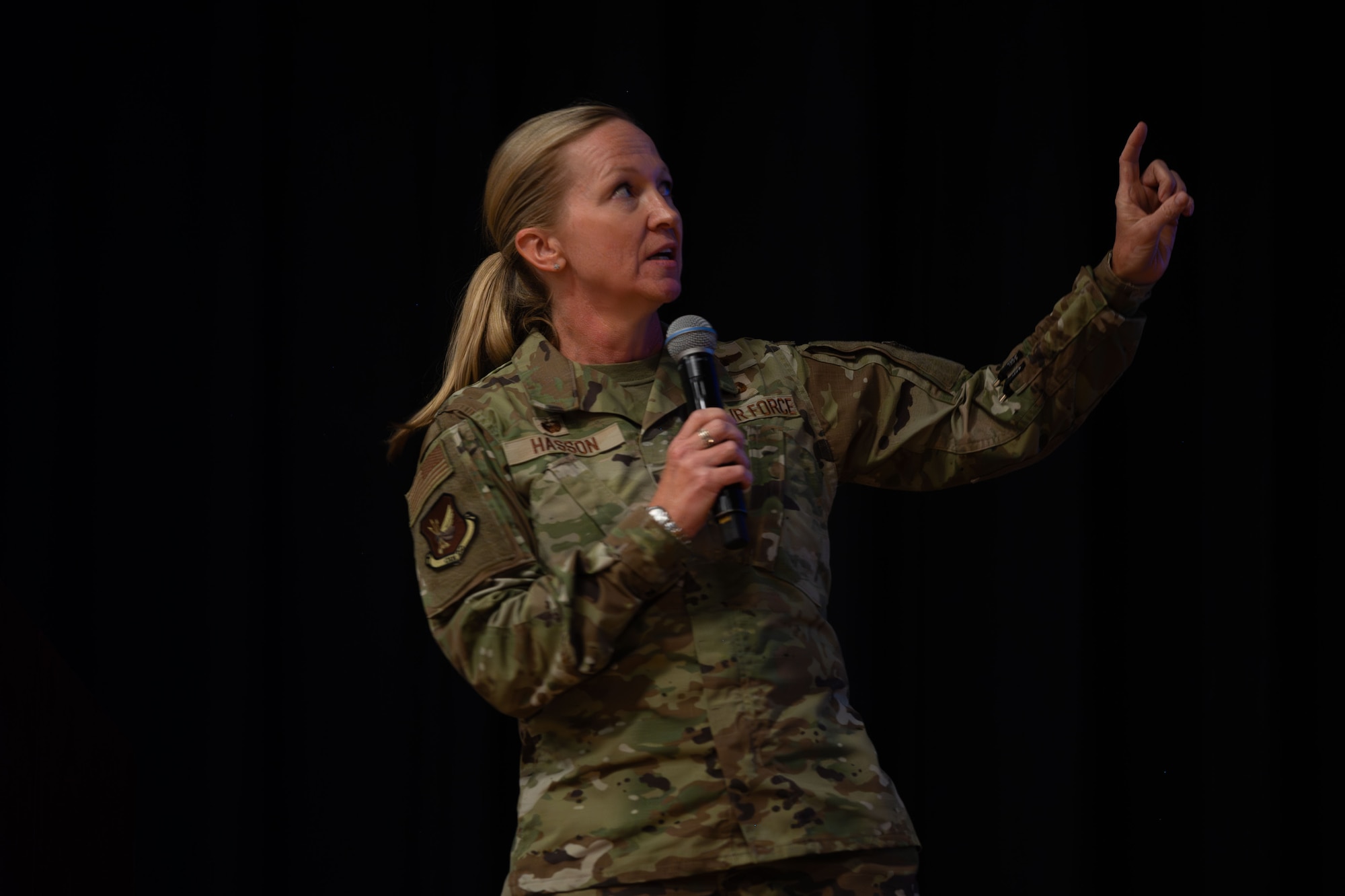 U.S. Air Force Col. Kathleen M. Hasson, 305th Air Mobility Wing commander, leads an all-call at Joint Base McGuire-Dix-Lakehurst, N.J., July 15, 2024. This was Hasson’s first 305th AMW all-call since assuming command of the wing on July 11. (U.S. Air Force photo by Staff Sgt. Monica Roybal)