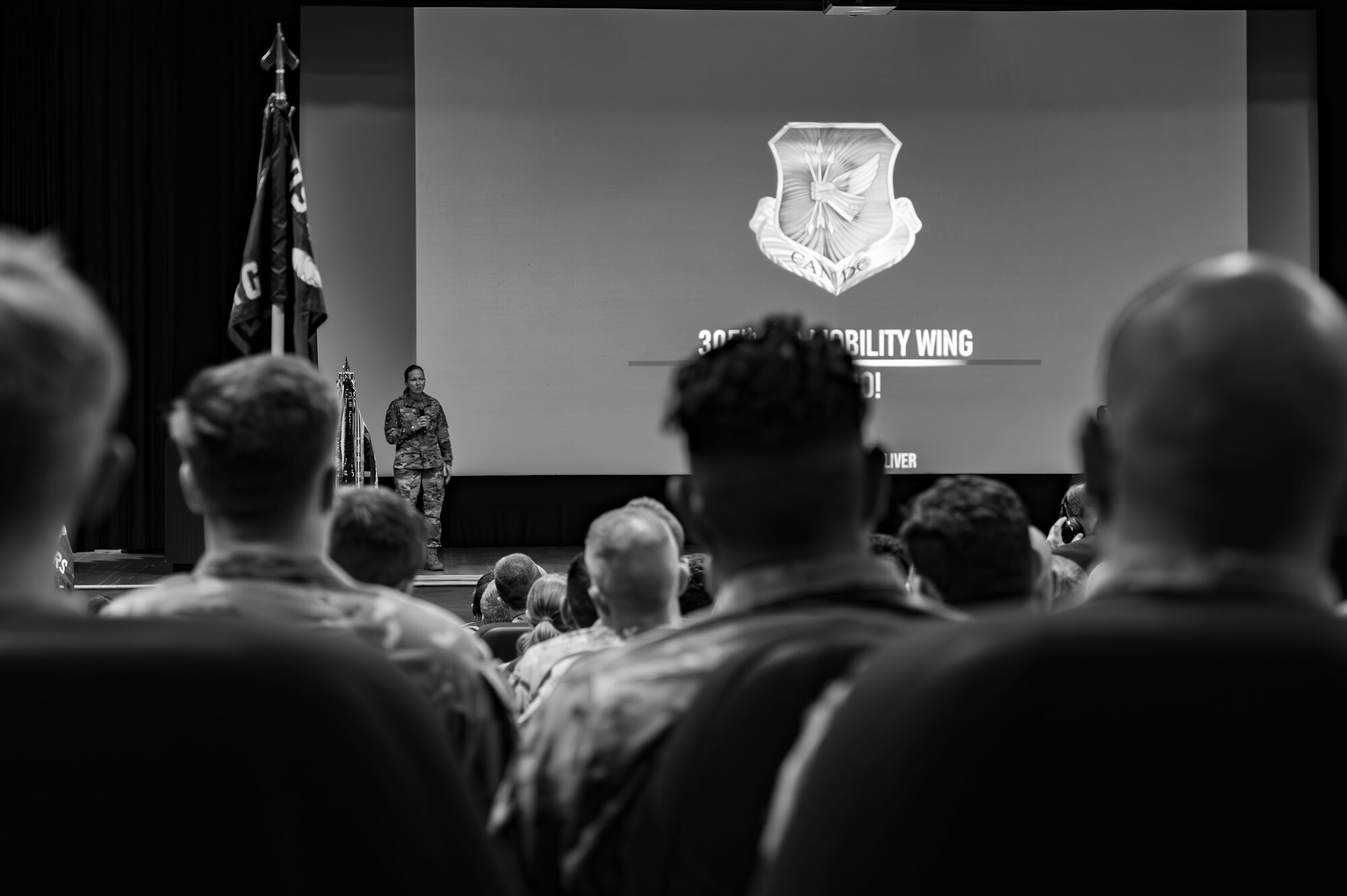U.S. Air Force Col. Kathleen M. Hasson, 305th Air Mobility Wing commander, leads an all-call at Joint Base McGuire-Dix-Lakehurst, N.J., July 15, 2024. This was Hasson’s first 305th AMW all-call since assuming command of the wing on July 11. (U.S. Air Force photo by 2nd Lt. Alexis Kula)
