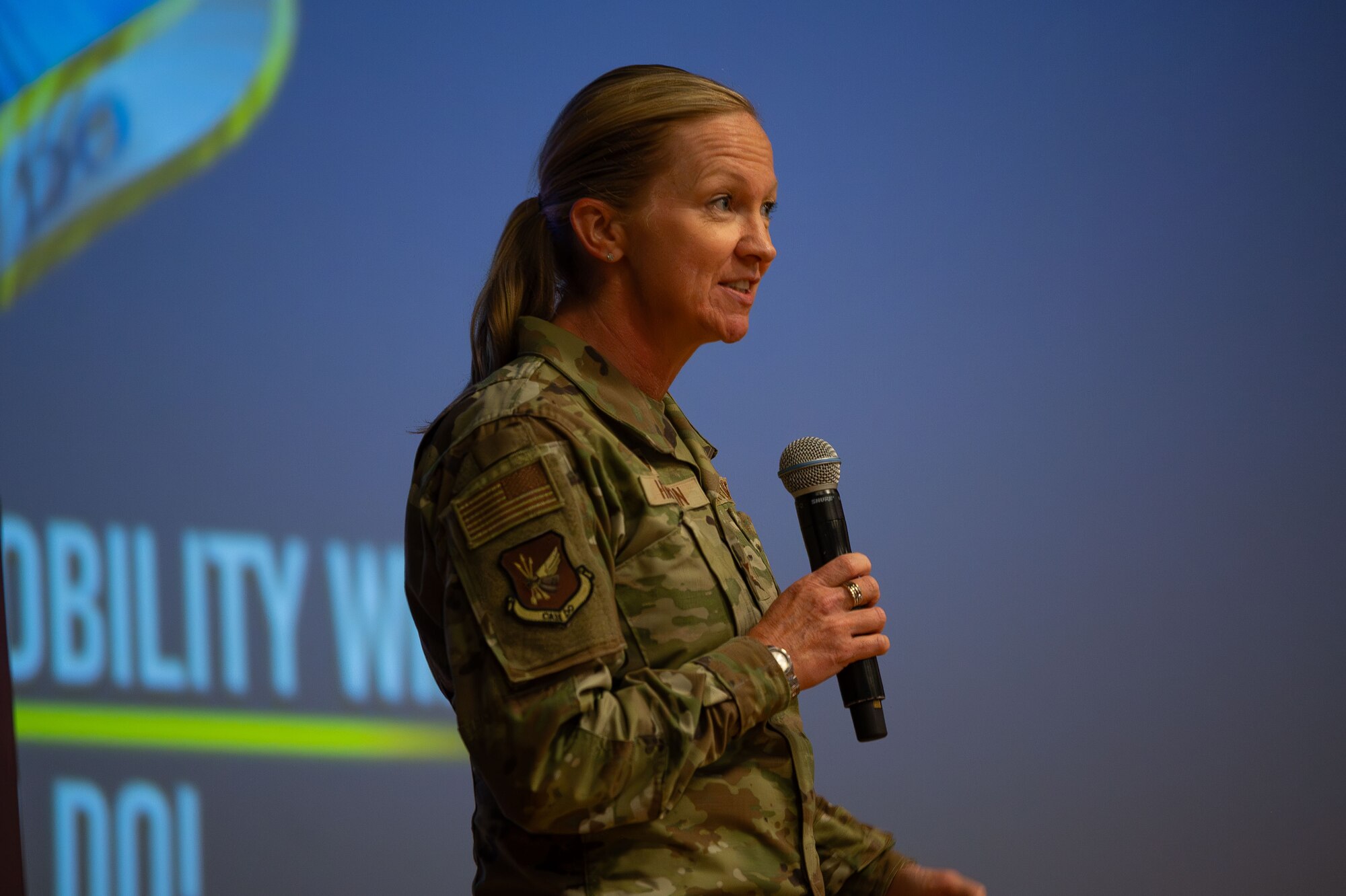 U.S. Air Force Col. Kathleen M. Hasson, 305th Air Mobility Wing commander, leads an all-call at Joint Base McGuire-Dix-Lakehurst, N.J., July 15, 2024. This was Hasson’s first 305th AMW all-call since assuming command of the wing on July 11. (U.S. Air Force photo by Staff Sgt. Monica Roybal)