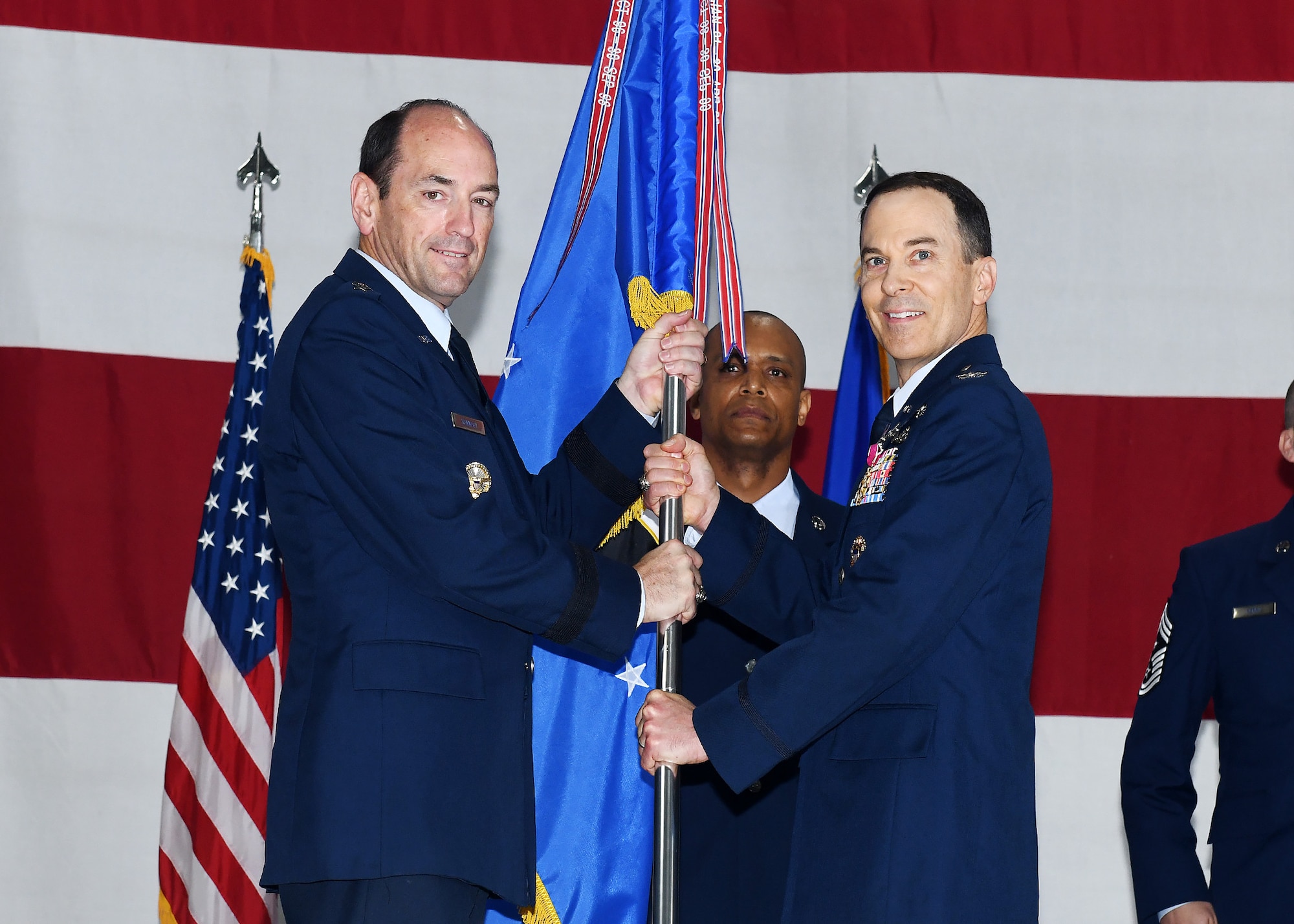 colonel passes guideon Lt. Gen.