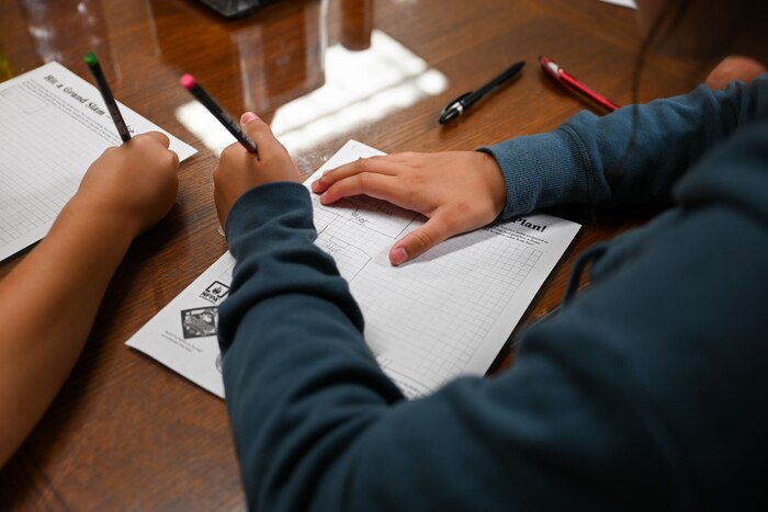 Emmie, 12, draws her exit drills in the house plan during the first day of 2024 Junior Firefighter Camp at the Goodfellow Fire Department, Goodfellow Air Force Base, Texas, July 8, 2024. The GFD hosted 12 local youth for the 2024 Junior Firefighter Camp, July 8-12, 2024. (U.S. Air Force photo by Airman 1st Class Evelyn J. D’Errico)