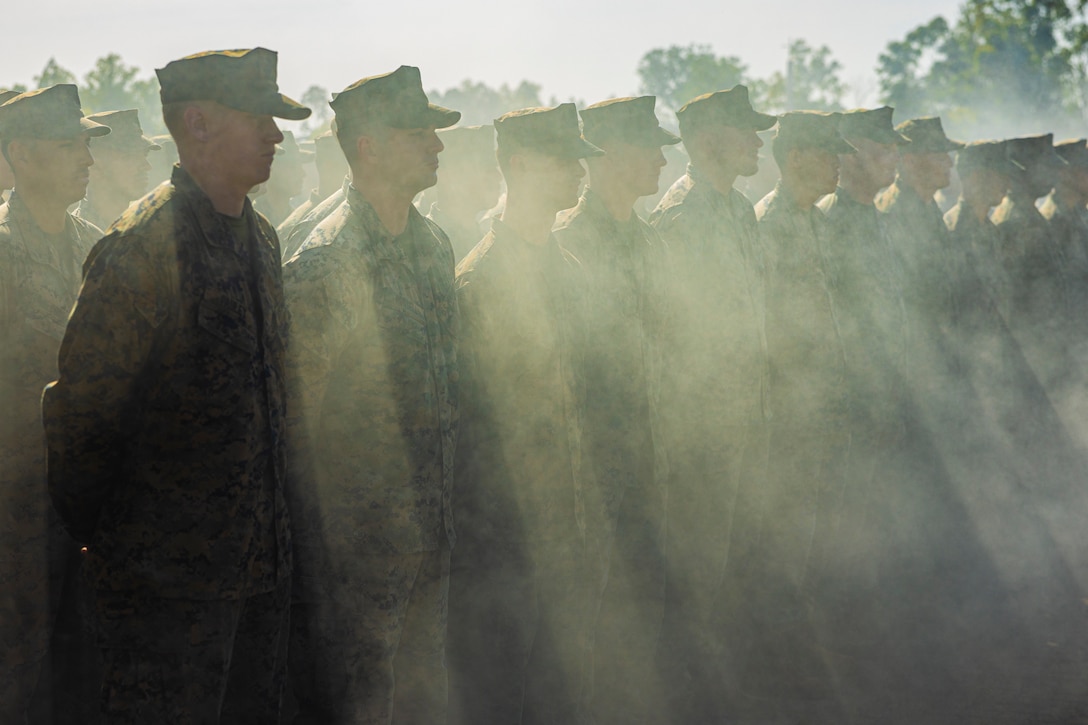 U.S. Marines with Marine Rotational Force – Darwin 24.3 stand at attention during the opening ceremony of Exercise Predator’s Run 24 at Robertson Barracks, NT, Australia, July 15, 2024. Exercise Predator’s Run 24 is a littoral-focused, multilateral training exercise led by the Australian Army’s 1st Brigade, involving the Australian Defence Force, British Armed Forces, and the U.S. Marine Corps. MRF-D 24.3’s participation in Exercise Predator’s Run 24 increases interoperability with Allies and partners, highlighting the effectiveness of combined operations. (U.S. Marine Corps photo by Sgt. Cristian Bestul)