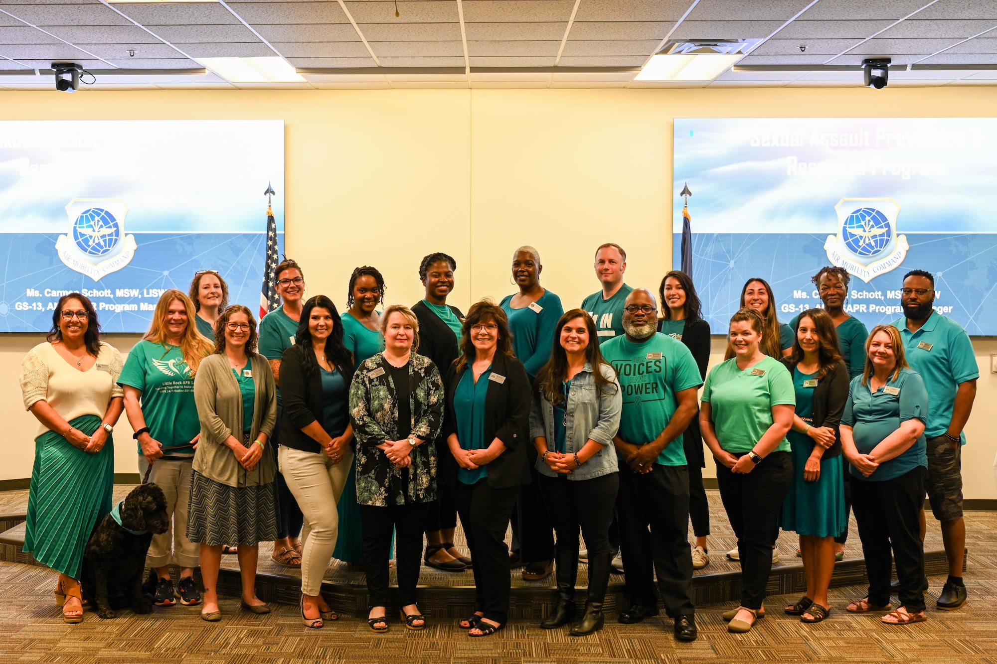 Sexual Assault Response Coordinators pose for a photo July 9, 2024, at McConnell Air Force Base, Kansas. SARCs and victim advocates meet for teambuilding and refresher training, allowing them to network and train to better help victims of sexual assault. (U.S. Air Force photo by Senior Airman William Lunn)