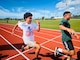 NAVAL BASE GUAM (May 31, 2024) - Youth from U.S. Naval Base Guam participate in a a ceremonial race during the reopening of the Charles King Fitness Center Track and Field, May 31. The $4.9 million contract included the removal of the damaged track, repair of the aggregate base course and drainage, new asphalt pavement, a new synthetic surfacing system, and a new electronic wireless scoreboard.