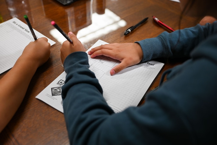 Emmie, 12, draws her exit drills in the house plan during the first day of 2024 Junior Firefighter Camp at the Goodfellow Fire Department, Goodfellow Air Force Base, Texas, July 8, 2024. The GFD hosted 12 local youth for the 2024 Junior Firefighter Camp, July 8-12, 2024. (U.S. Air Force photo by Airman 1st Class Evelyn J. D’Errico)