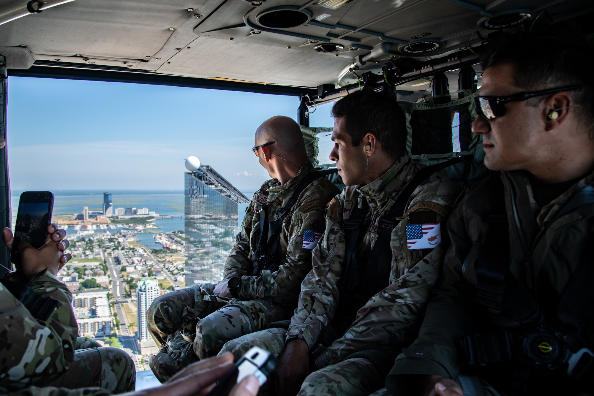 U.S. Air Force 177th Civil Engineers Squadron explosive ordnance disposal team technicians and 70th Combat Engineer Battalion of the National Guard of the Republic of Cyprus EOD technicians ride in a U.S. Army National Guard UH-60 Blackhawk from Fort Dix June 13, 2024, at the 177th Fighter Wing, Egg Harbor Township, New Jersey.