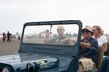 commander waving at the camera