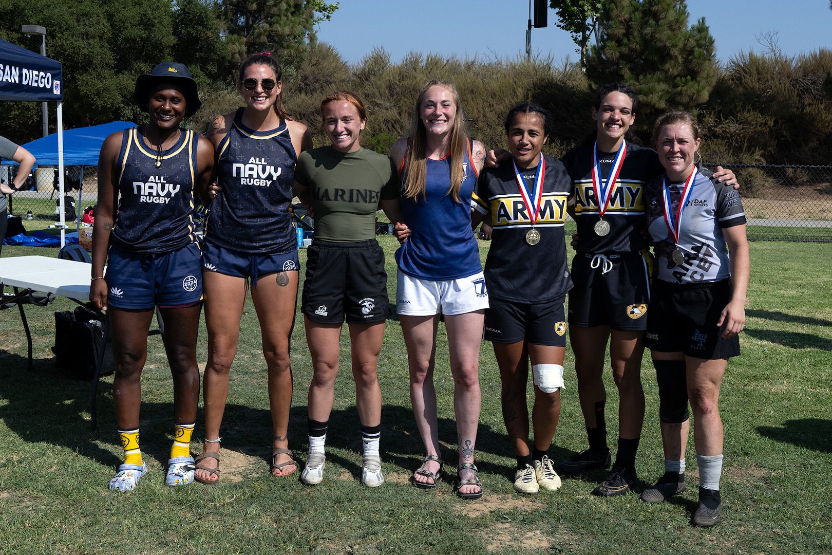 From left to right.  All-Tournament team selections:  Navy Petty Officer 3rd Class Alex Sutton, NAS Jacksonville, Florida, Navy Ensign Megan Neyen, NB Pearl Harbor, Hawaii, Marine Cpl. Anastasia Schraff, MCAS Miramar, Calif. Coast Guard Lt. Hollis Connick, Sector Delaware Bay, Pa.,  Army Sgt. Joanne Fa'avesi, Ft. Carson, Colo., Army 1st Lt. Cienna Jordan, Army Reserves, Air Force Capt. Adrienne Yoder, Ramstein AFB, Germany.The 2024 Armed Forces Women’s Rugby Championships held in conjunction with the San Diego Surfers Women’s Rugby Club 7’s Tournament in San Diego, Calif. from July 12-13. Service members from the Army, Marine Corps, Navy, Air Force (with Space Force players), and Coast Guard battle it out for gold.