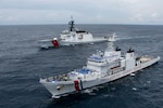 U.S. Coast Guardsmen, assigned to U.S. Coast Guard Cutter Waesche (WMSL-751), pass honors to members of the Philippine Coast Guard, assigned to Philippine Coast Guard Vessel Melchora Aquino (MRRV-9702), during a bilateral search and rescue exercise in the South China Sea, July 16, 2024.
