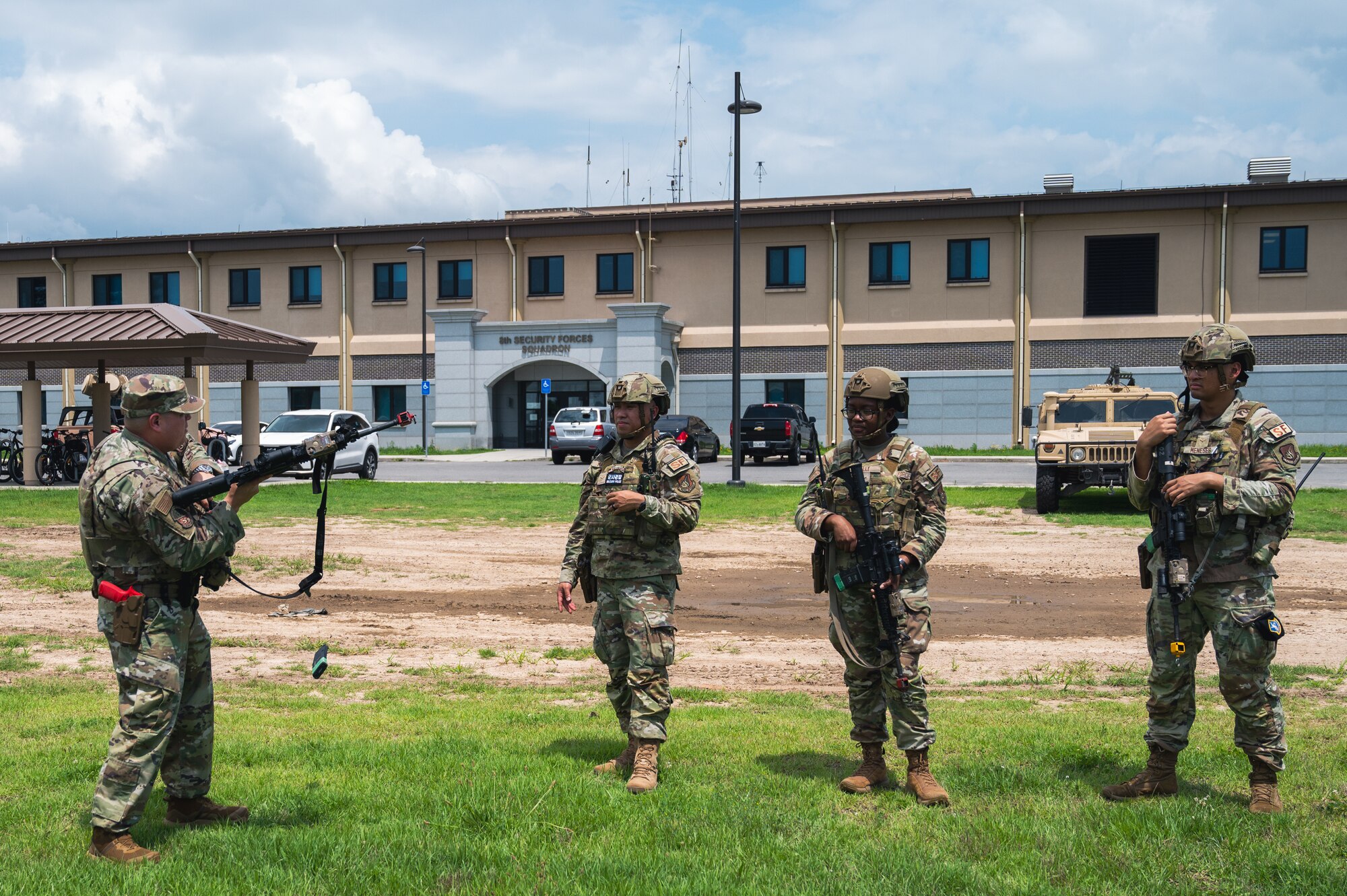 Tech. Sgt. Erick Rodriguez, 8th Security Forces Squadron section chief of training, instructs members on how to perform a rapid reload during Beverly Sentinel 24-2 at Kunsan Air Base, Republic of Korea