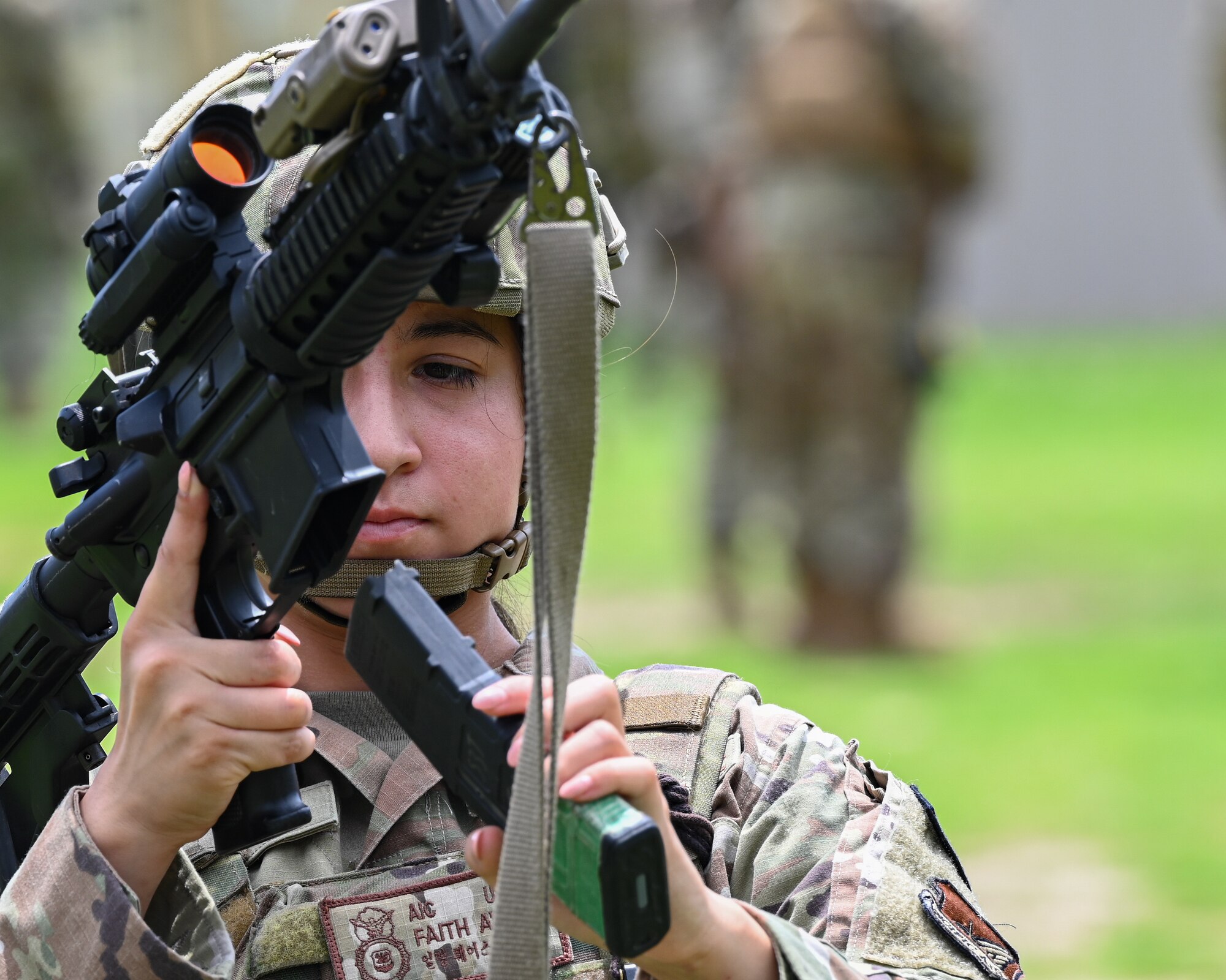 Airman 1st Class Faith Avila, 8th Security Forces Squadron defender, practices reload drills as part of exercise Beverly Sentinel 24-2 at Kunsan Air Base, Republic of Korea