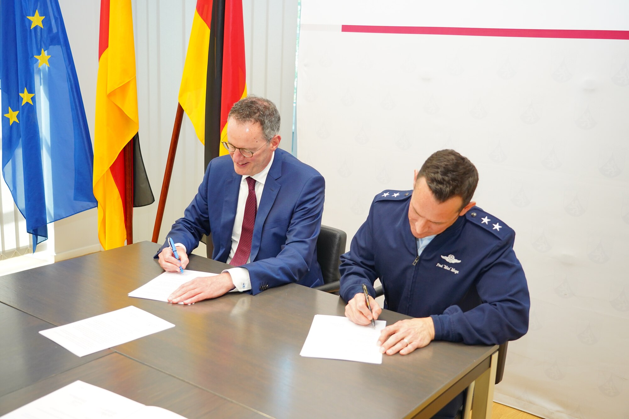 Maj. Gen. Paul D. Moga, Third Air Force and Kaiserslautern Military Community commander, and Michael Ebling, State Minister of the Interior of Rhineland-Palatinate, signed a cooperation agreement establishing a partnership between the KMC and the Police Presidium West Palatinate with the aim of preventing and reducing DUI offenses in the area July 15, 2024.