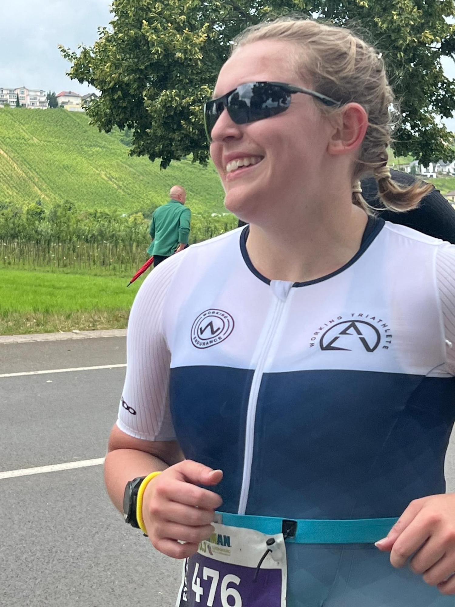One person running and smiling during a race