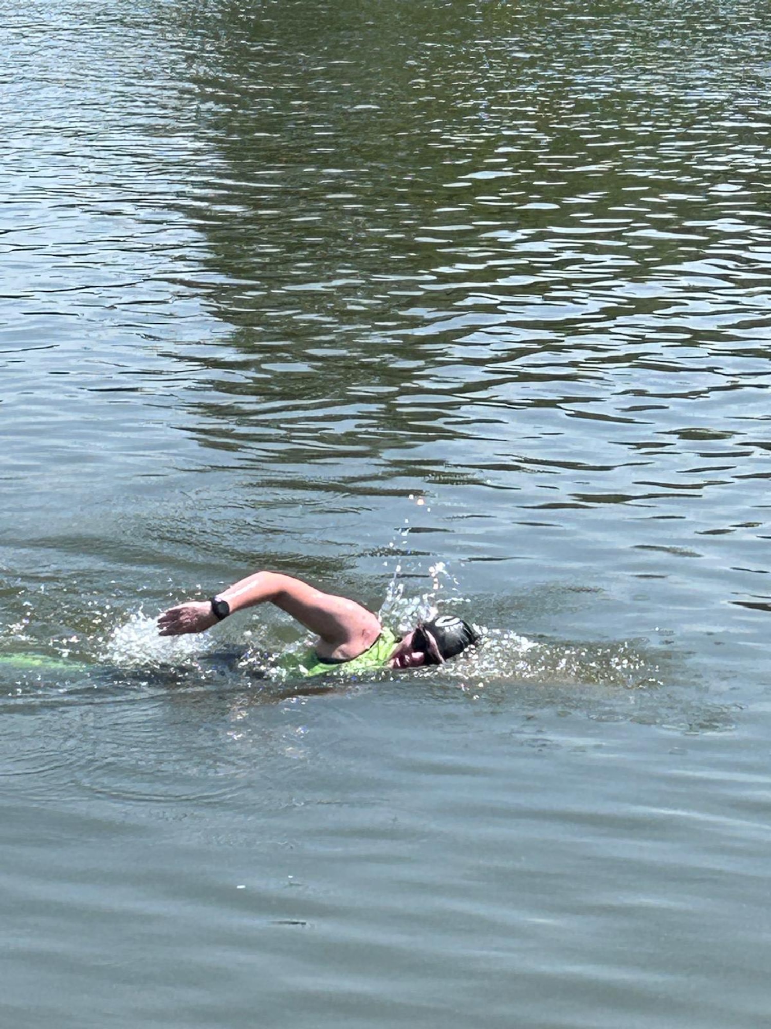 One person swimming in a river
