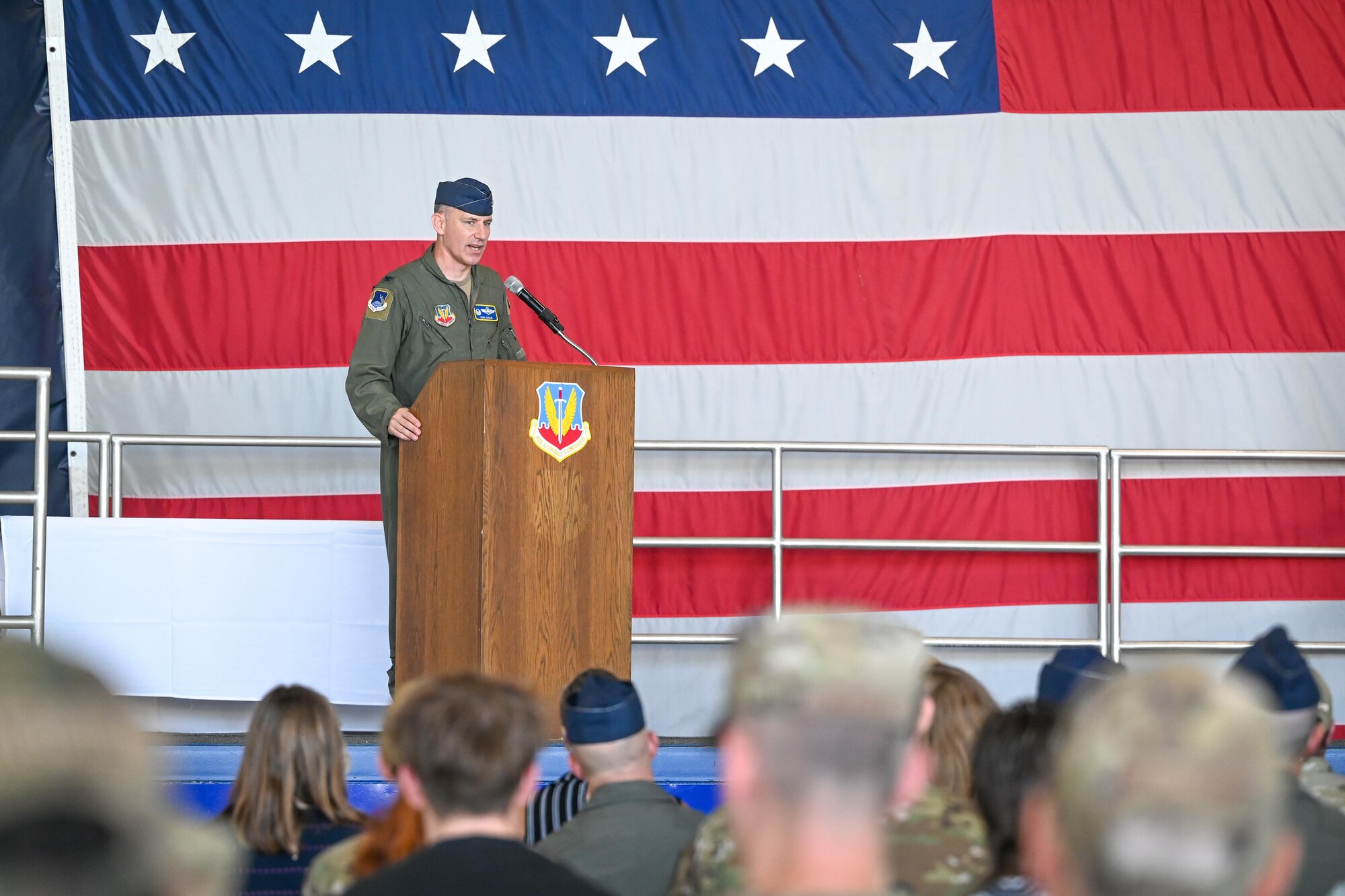 Col Whisler delivers a speech to a crowd.