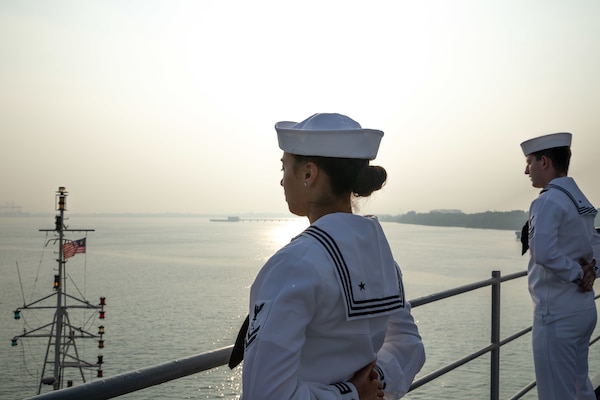 240717-N-XL529-1005
PORT KLANG, Malaysia (July 17, 2024) - Operations Specialist 2nd Class Victoria Marshall, from Murrieta, California, mans the rails as the U.S. 7th Fleet flagship USS Blue Ridge (LCC 19) arrives in Port Klang, Malaysia for a scheduled port visit, July 17, 2024. 7th Fleet is the U.S. Navy's largest forward-deployed numbered fleet, and routinely interacts and operates with allies and partners in preserving a free and open Indo-Pacific region. (U.S. Navy photo by Lt. j.g. Sarah Merrill)