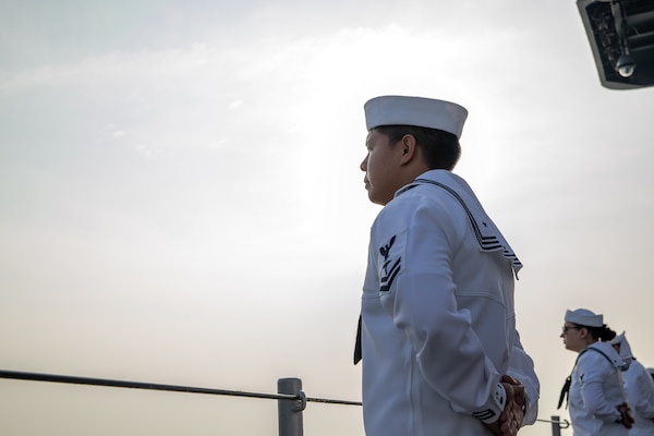 240717-N-XL529-1004
PORT KLANG, Malaysia (July 17, 2024) - Hospital Corpsman 2nd Class Rene Cruz, from Seattle, mans the rails as the U.S. 7th Fleet flagship USS Blue Ridge (LCC 19) arrives in Port Klang, Malaysia for a scheduled port visit, July 17, 2024. 7th Fleet is the U.S. Navy's largest forward-deployed numbered fleet, and routinely interacts and operates with allies and partners in preserving a free and open Indo-Pacific region. (U.S. Navy photo by Lt. j.g. Sarah Merrill)