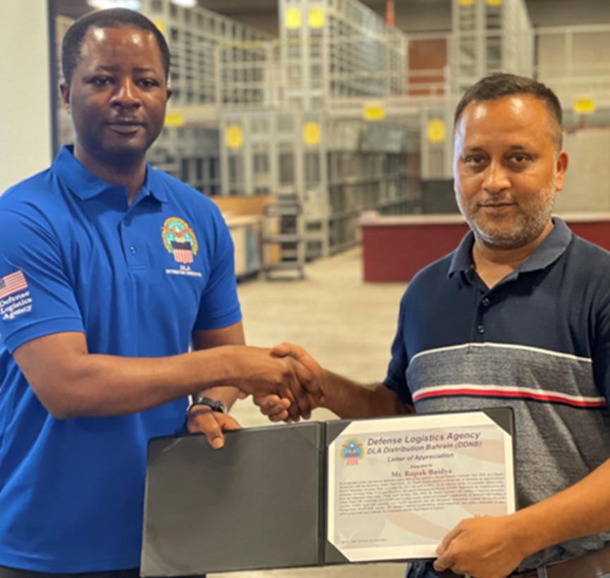 Employee receiving award.