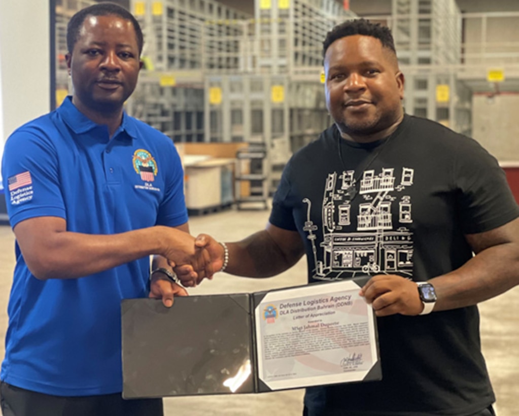 Employee receiving award.