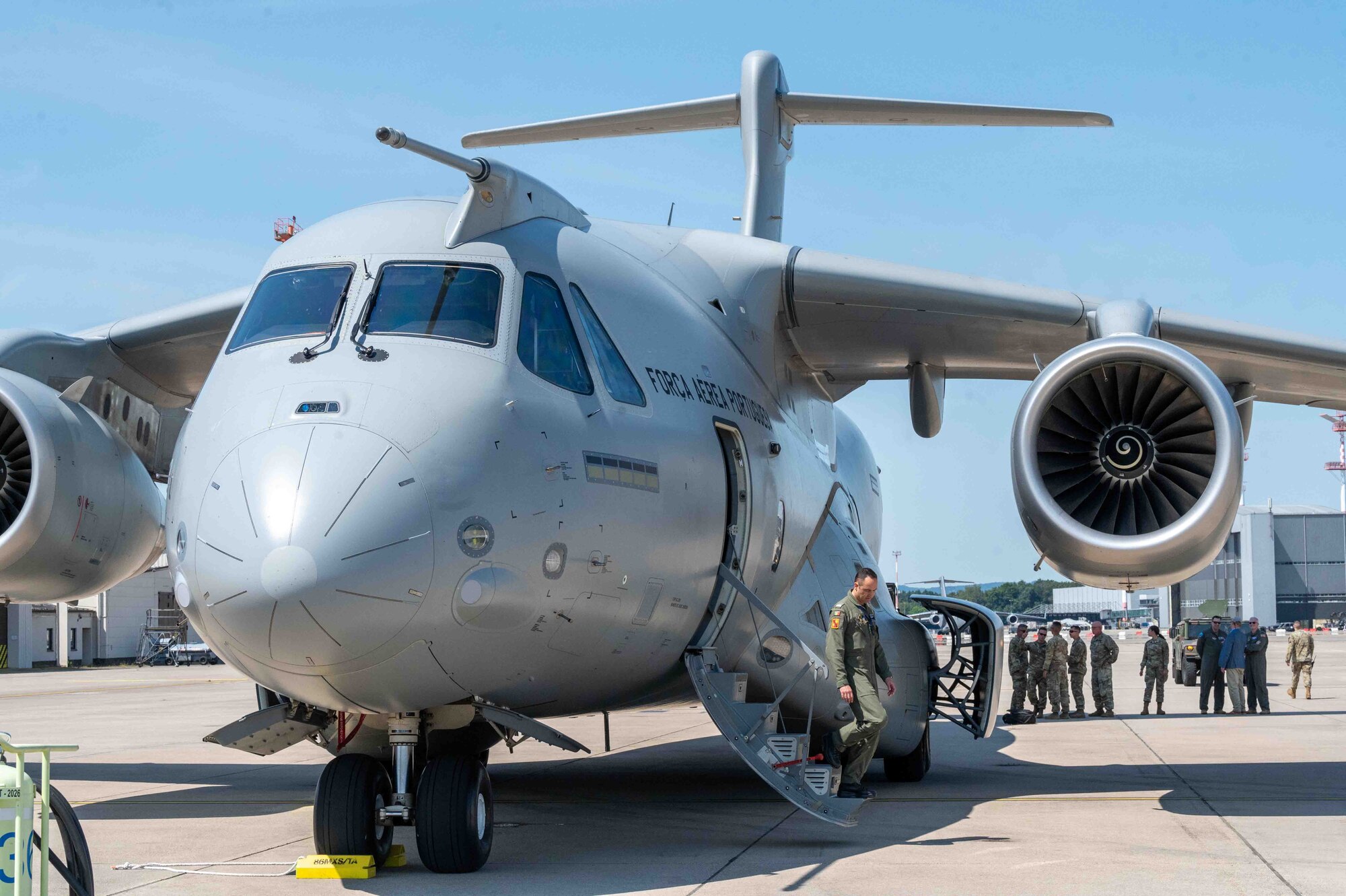 Portuguese Air Force Maj. Miguel Pousa, 506th Squadron commander, exits a PAF KC-390 Millennium aircraft during cold load training