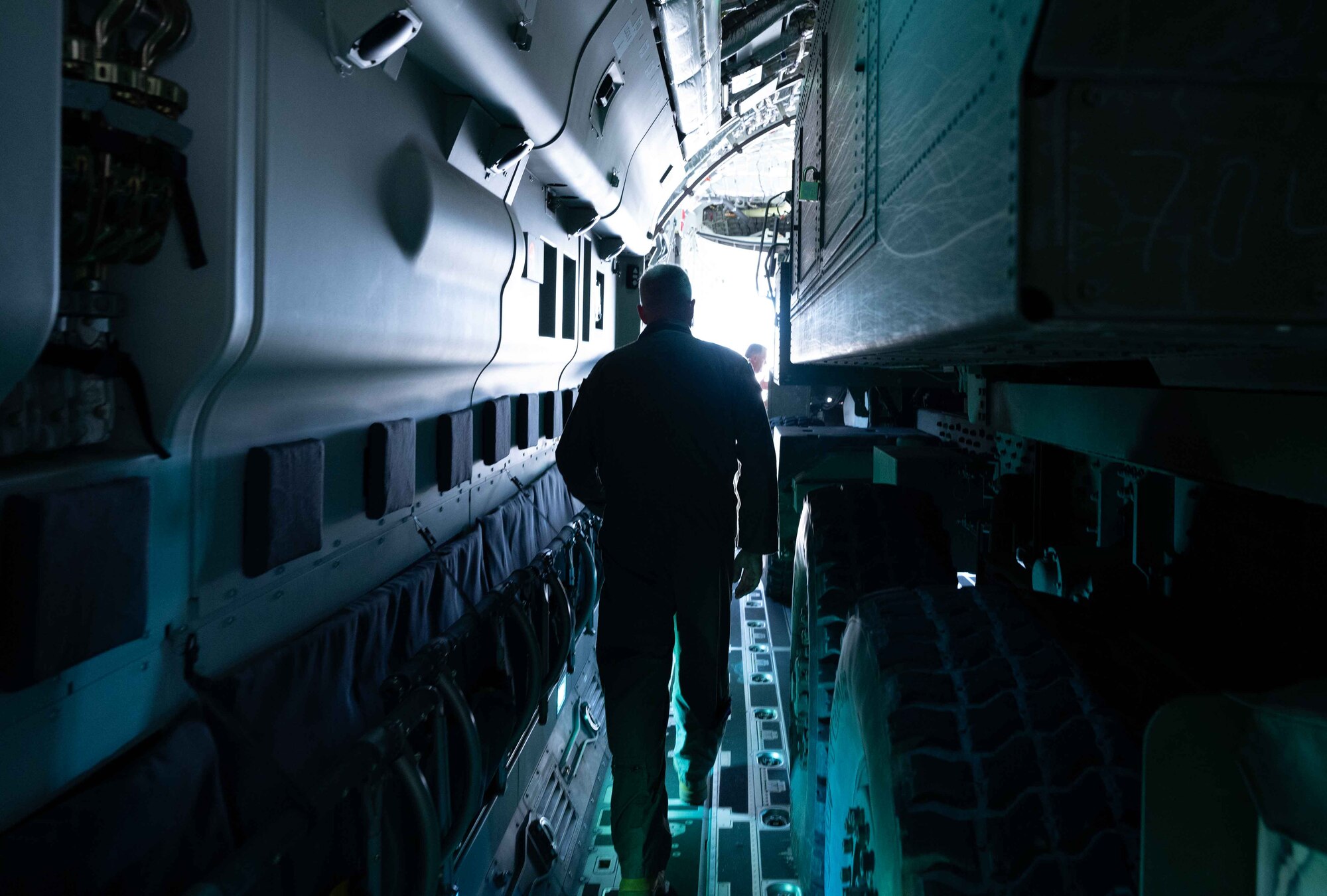 Portuguese Air Force Master Sgt. Hugo Coelho, 506th Squadron loadmaster, inspects a KC-390 Millennium aircraft cargo bay